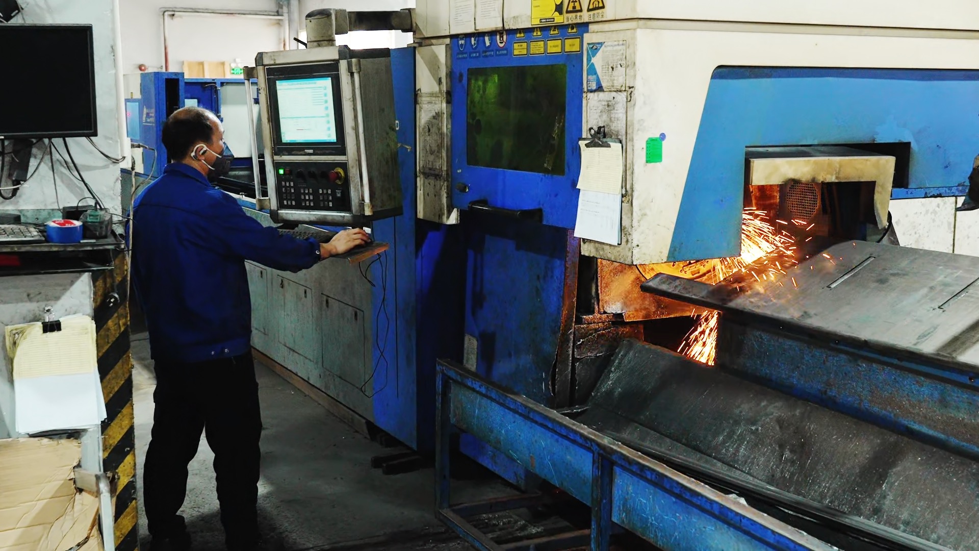 CNC metal grinding machine in operation