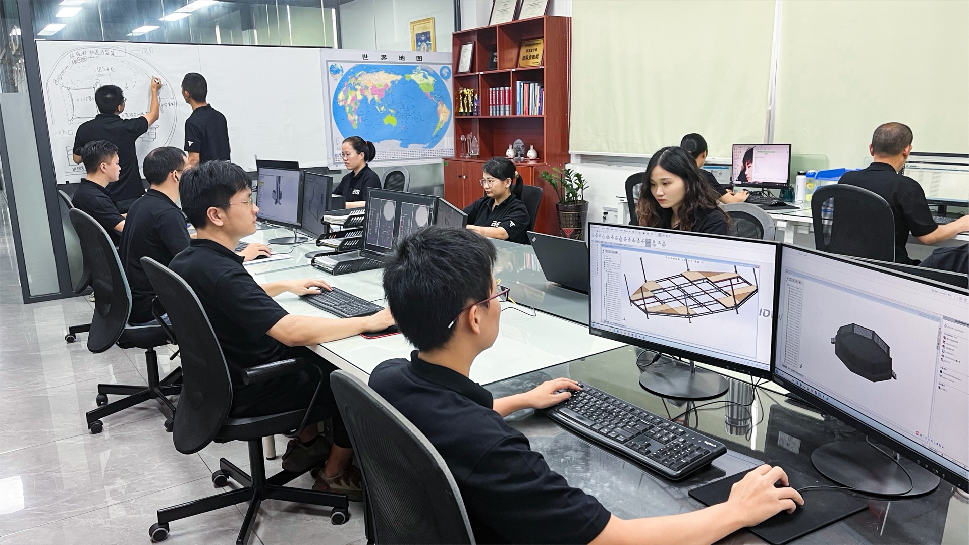Engineering team working on CAD design and technical review